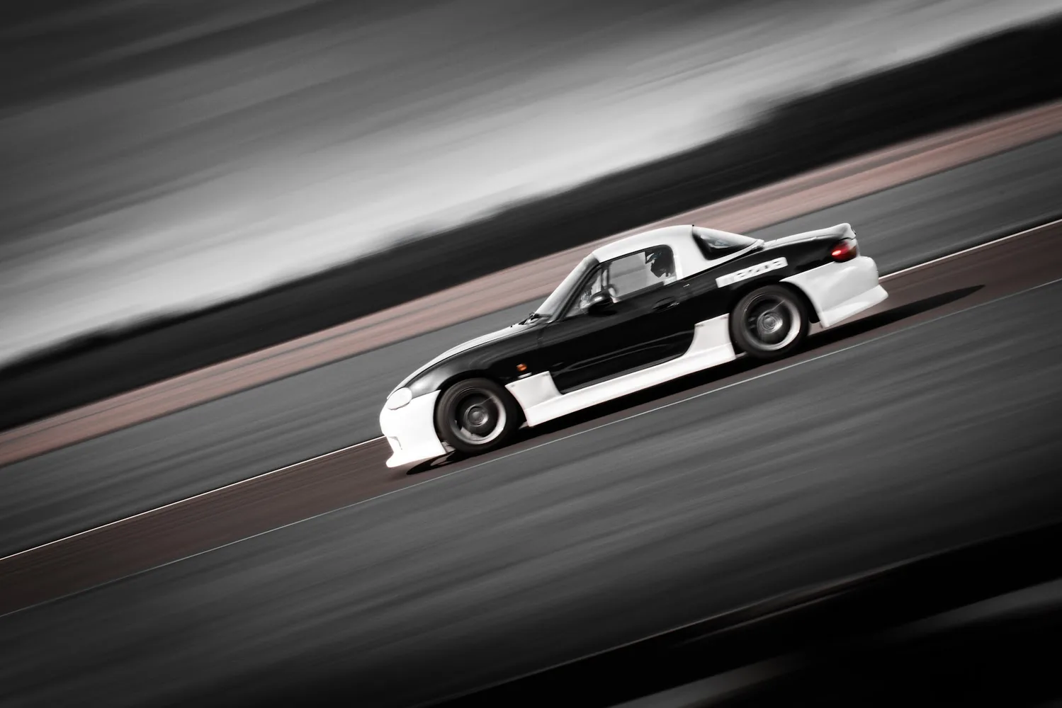 Drift car photographed at speed on a track